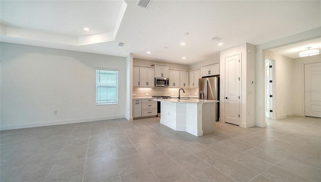 Furnished interior view inside a new home in Windward Real Estate and Homes for Sale in Sarasota, FL - Neal Communities, Lakewood Ranch (Image 10).