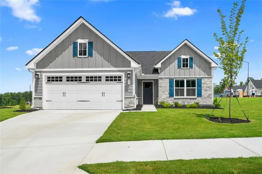 Front exterior of a new home in , Dallas, GA, highlighting curb appeal (Image 22).