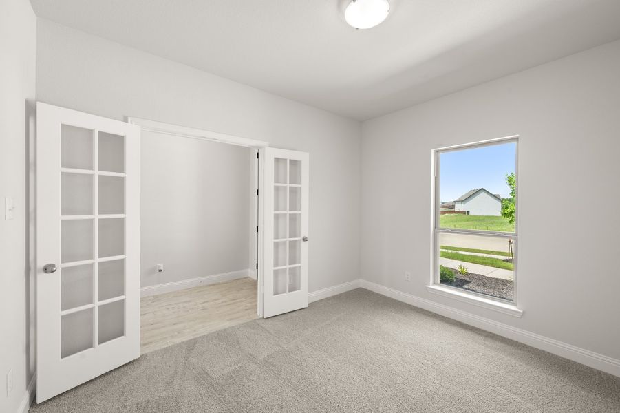 Front exterior of a new home in Still Water Lake Estates, Godley, TX, highlighting curb appeal (Image 15).
