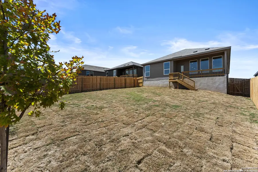 Front exterior of a new home in Waterwheel: Coastline Collection, San Antonio, TX, highlighting curb appeal (Image 1).