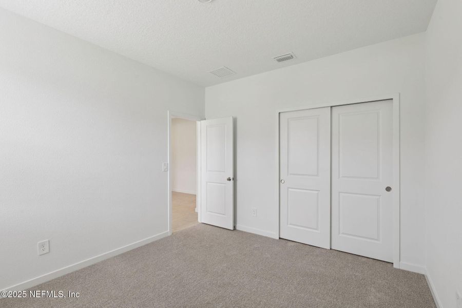 Spacious, unfurnished interior of a new home in Flagler Village - Signature Series, Palm Coast (Image 31).