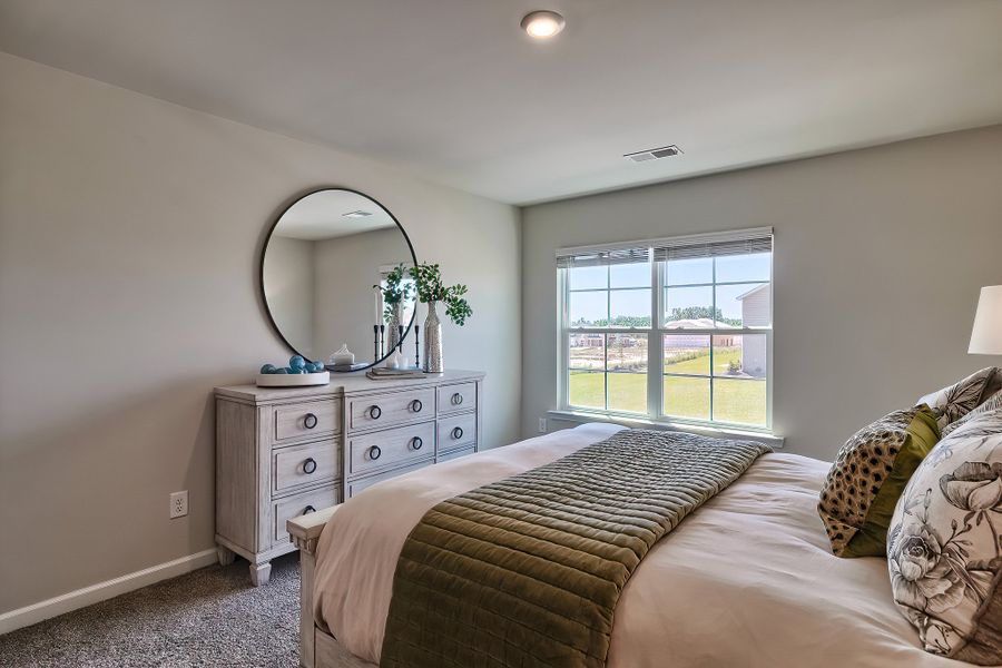 Representative furnished interior of a home built from the Poplar A by McGuinn Homes in Reserve at Mill Creek, Columbia (Image 32).
