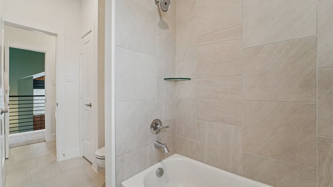 Representative interior finishes for a home built from the Laramie by Chesmar Homes in Wildrye 45', Waller (Image 22). Representative interior finishes for a home built from the Laramie by Chesmar Homes in Wildrye 45', Waller (Image 22).