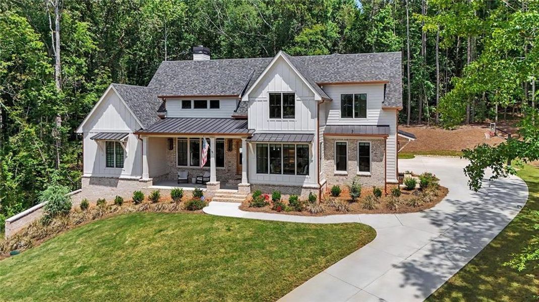 Front exterior of a new home in , Monroe, GA, highlighting curb appeal (Image 28). Front exterior of a new home in , Monroe, GA, highlighting curb appeal (Image 28).