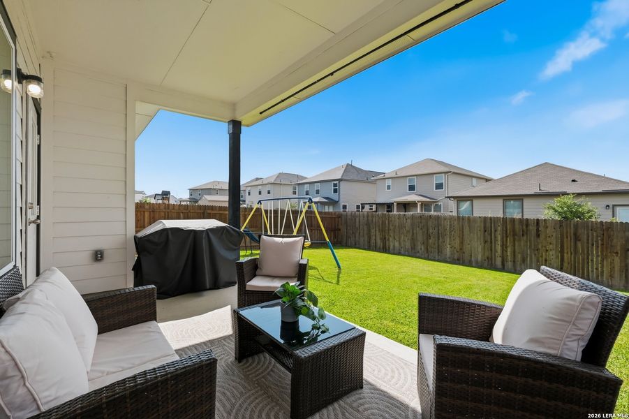 Exterior details and patio area of a home in Willow View, Converse (Image 23).