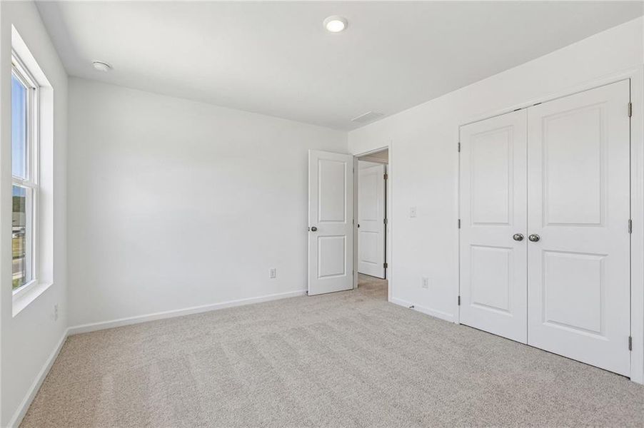 Spacious, unfurnished interior of a new home in Weatherfield, Buford (Image 24).