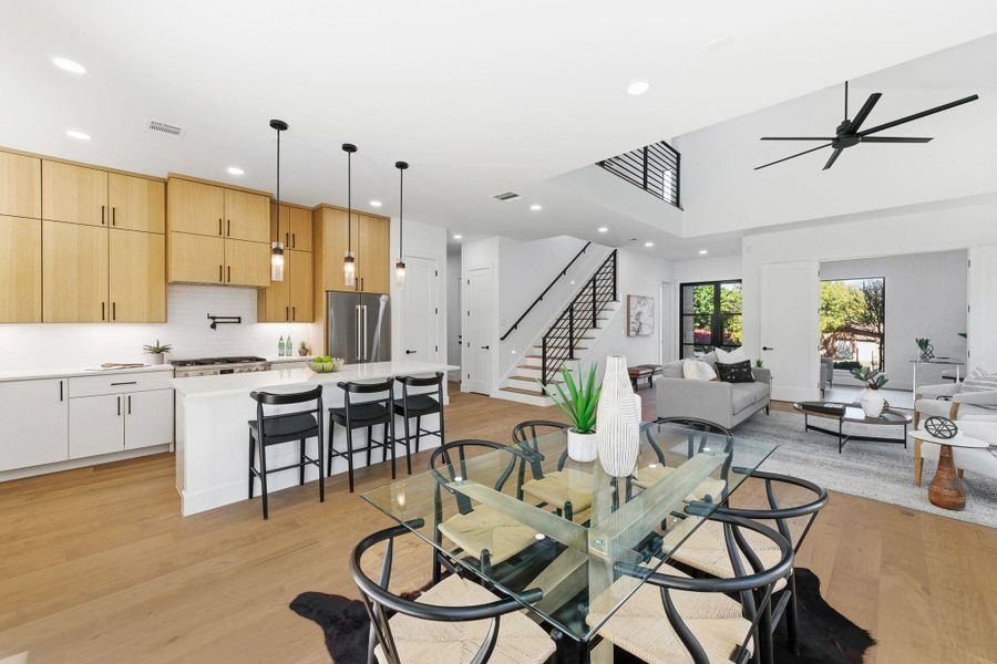 Dining space featuring recessed lighting and light wood-type flooring plus opens to kitchen and access to private backyard Dining space featuring recessed lighting and light wood-type flooring plus opens to kitchen and access to private backyard