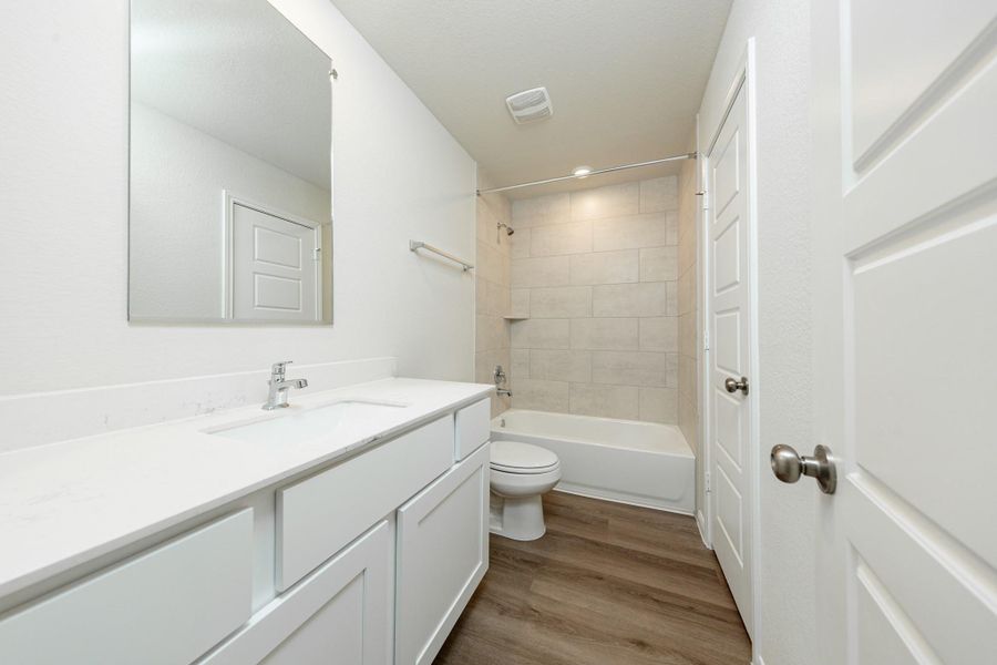 Furnished interior view inside a new home in River's Edge, Conroe (Image 14).