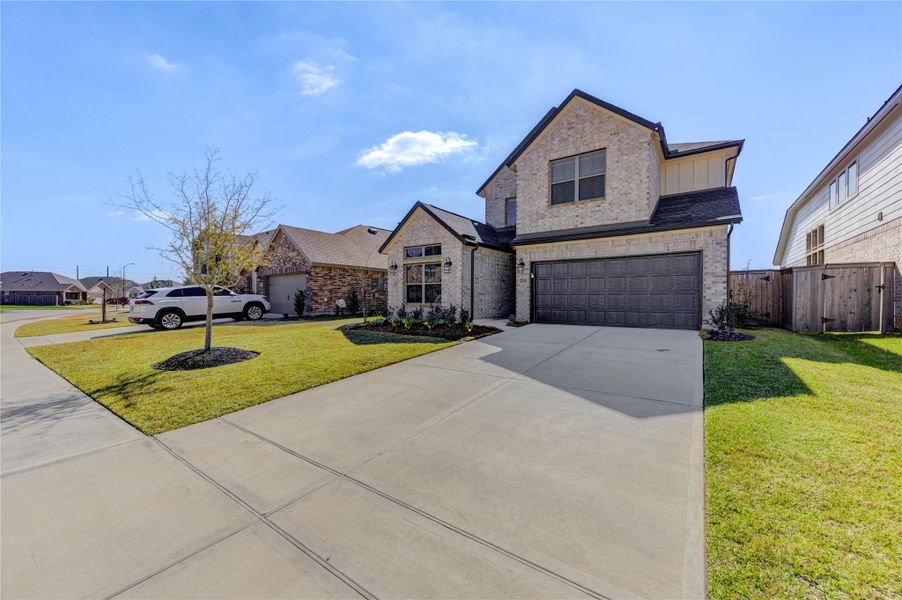 Front exterior of a new home in , Hockley, TX, highlighting curb appeal (Image 2). Front exterior of a new home in , Hockley, TX, highlighting curb appeal (Image 2).