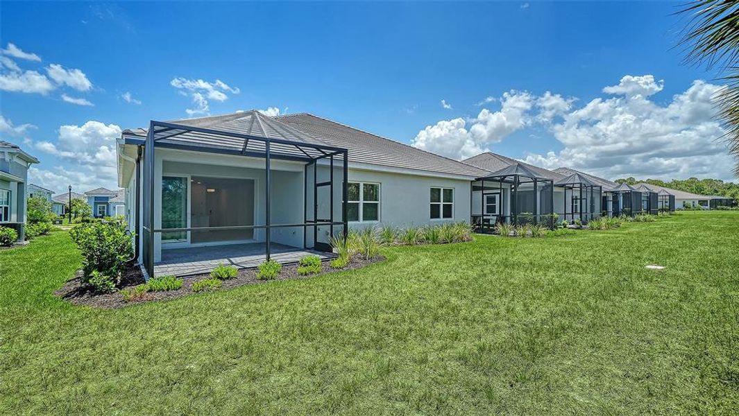 Exterior details and patio area of a home in Windward Real Estate and Homes for Sale in Sarasota, FL - Neal Communities, Lakewood Ranch (Image 20).