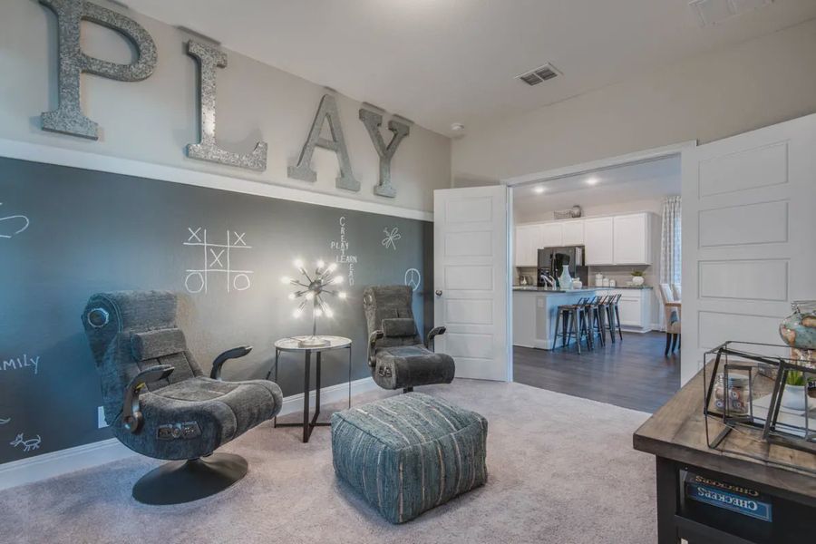 Representative furnished interior of a home built from the Sage by Chesmar Homes in Stillwater Ranch, Buda (Image 6).