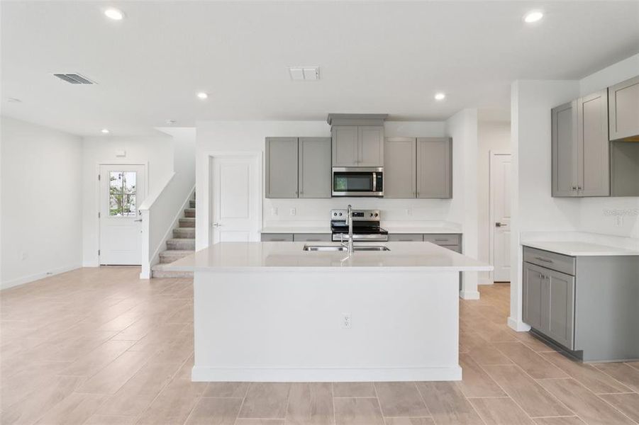 Furnished interior view inside a new home in Cyrene at Harmony, St. Cloud (Image 8).
