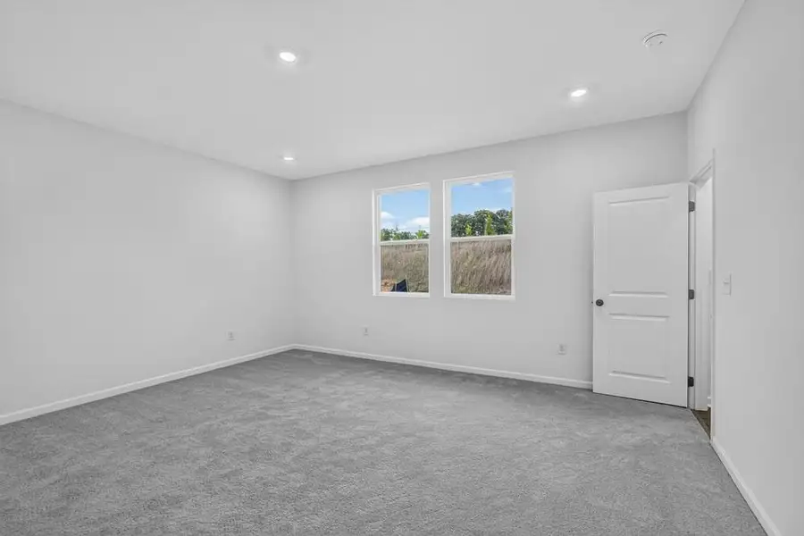 Spacious, unfurnished interior of a new home in Weatherfield, Buford (Image 18).