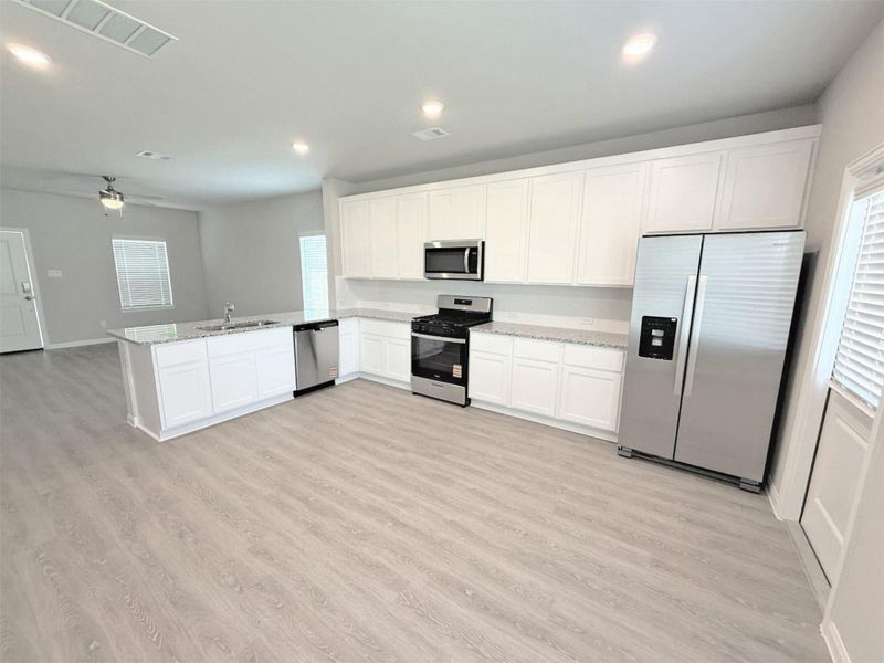 Refrigerator included with acceptable offer.