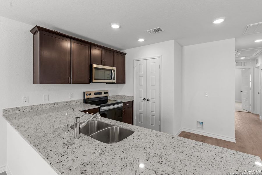 Furnished interior view inside a new home in Vista Real, Converse (Image 13).