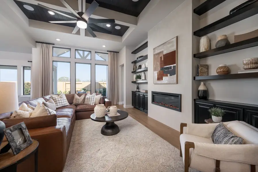 Furnished interior view inside a new home in Ellwood, Iowa Colony (Image 5).