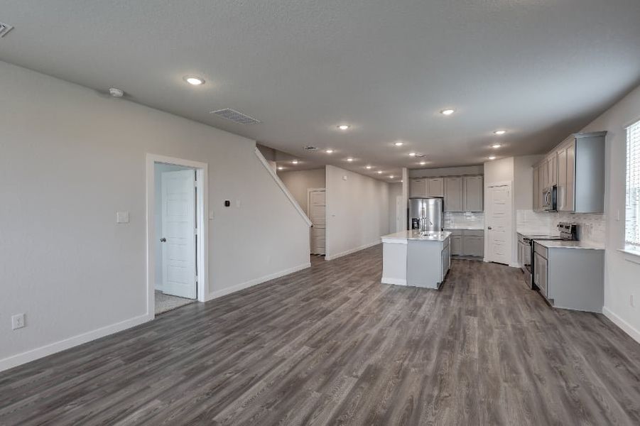 A large empty kitchen. A large empty kitchen.