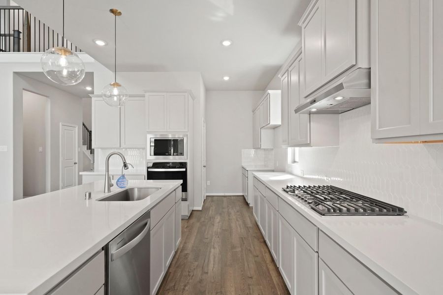 Furnished interior view inside a new home in Bridgeland 55', Cypress (Image 9).