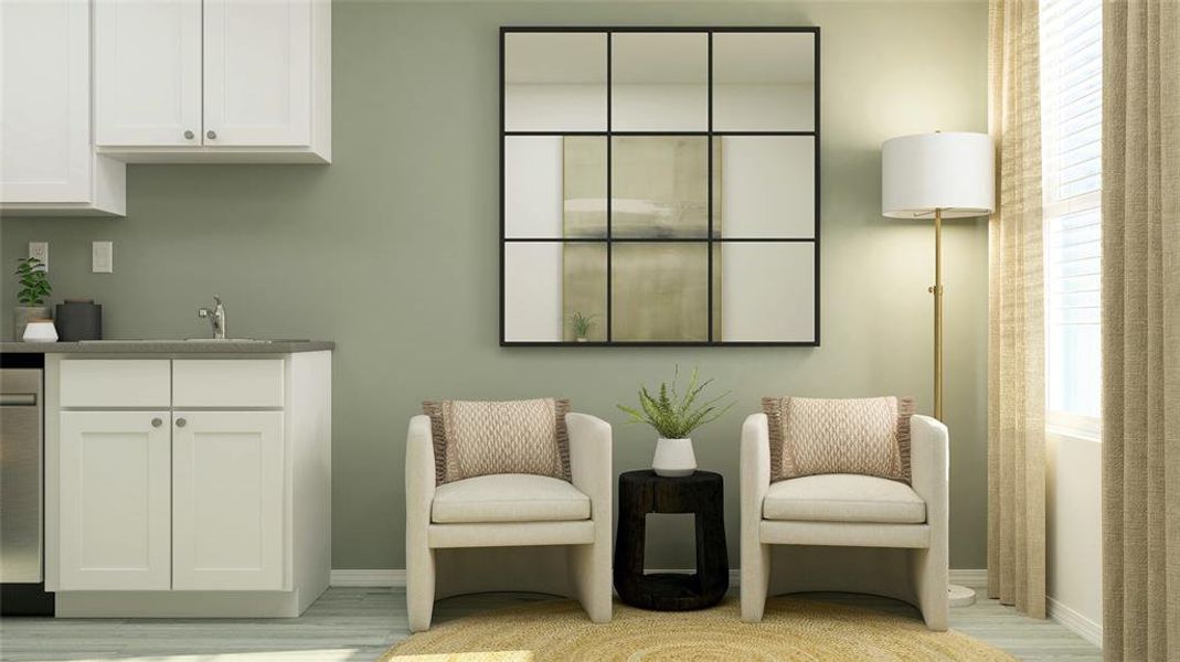 Sitting room with light wood-type flooring and wet bar Sitting room with light wood-type flooring and wet bar
