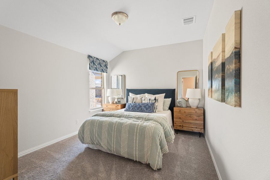 Furnished interior view inside a new home in Lake Pointe, Little Elm (Image 11).