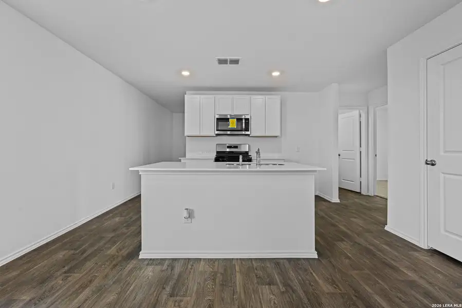 Furnished interior view inside a new home in Avenida, Converse (Image 5).