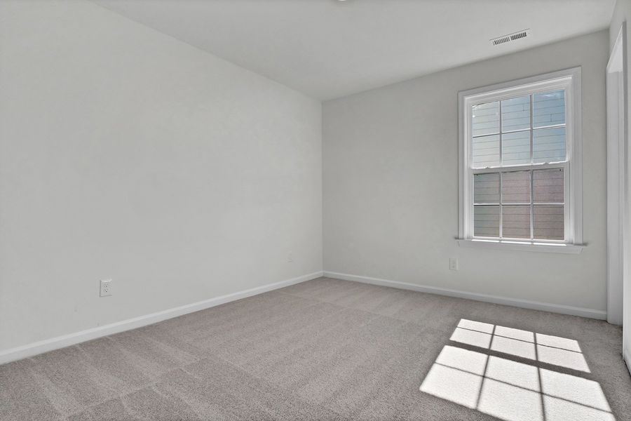 Spacious, unfurnished interior of a new home in Grand Park, Leland (Image 27). Spacious, unfurnished interior of a new home in Grand Park, Leland (Image 27).