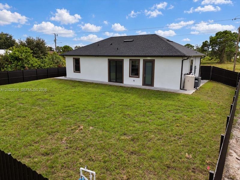 Exterior details and patio area of a home in , Lehigh Acres (Image 29).