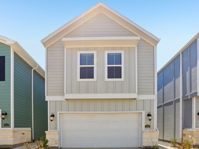 Front exterior of a new home in Kemah Crossing - City Series, Kemah, TX, highlighting curb appeal (Image 1). Front exterior of a new home in Kemah Crossing - City Series, Kemah, TX, highlighting curb appeal (Image 1).