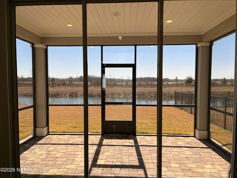 Exterior details and patio area of a home in Silver Falls Single Family at SilverLeaf, St. Augustine (Image 2).