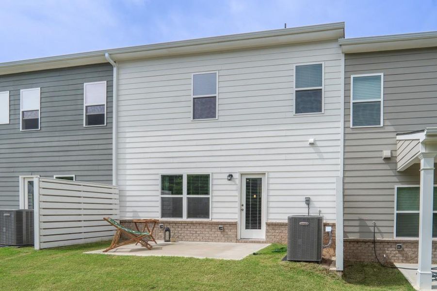 Exterior details and patio area of a home in Ellison Square, Sugar Hill (Image 4).
