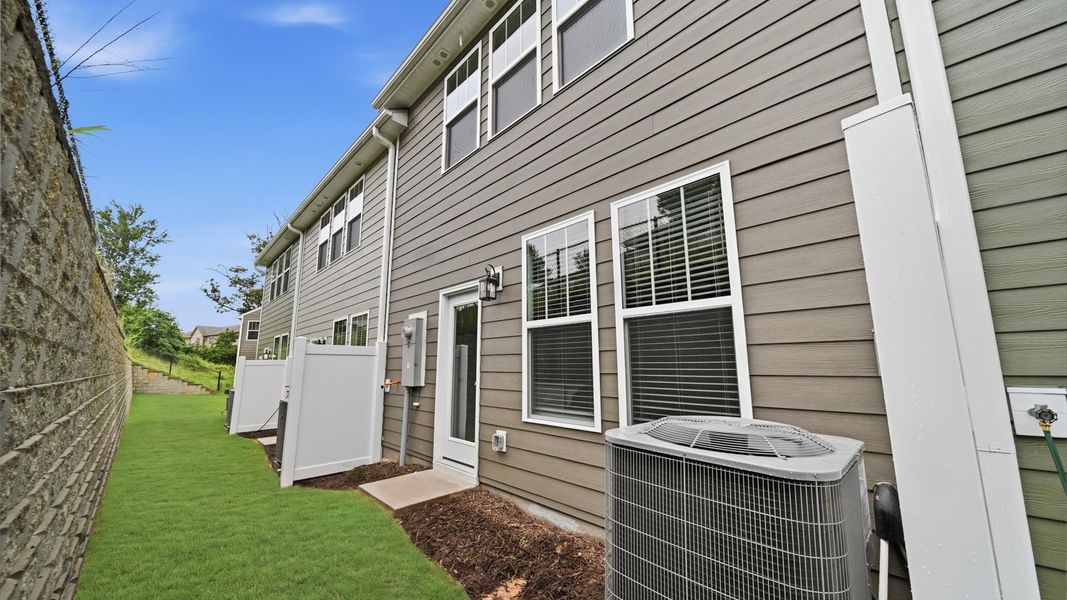 Exterior details and patio area of a home in Clayton Crossing, Arden (Image 3).