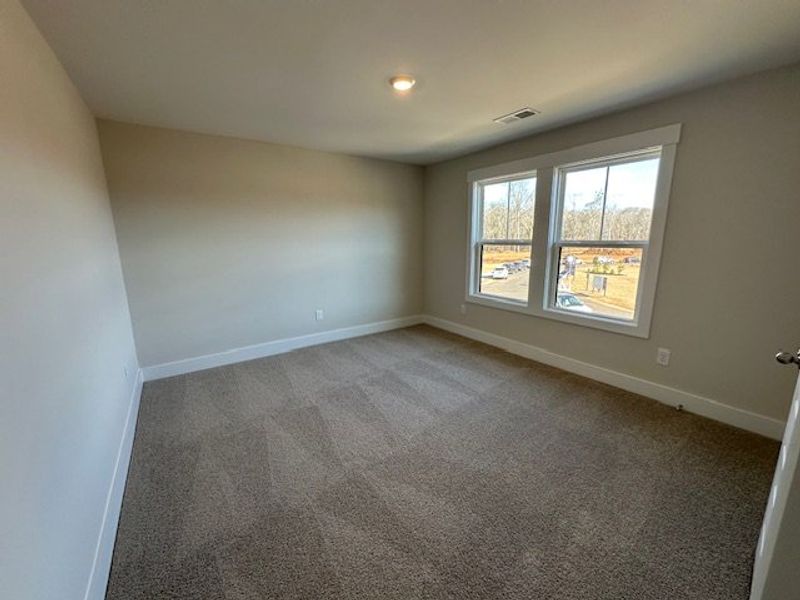 This inviting bedroom provides a comfortable and t