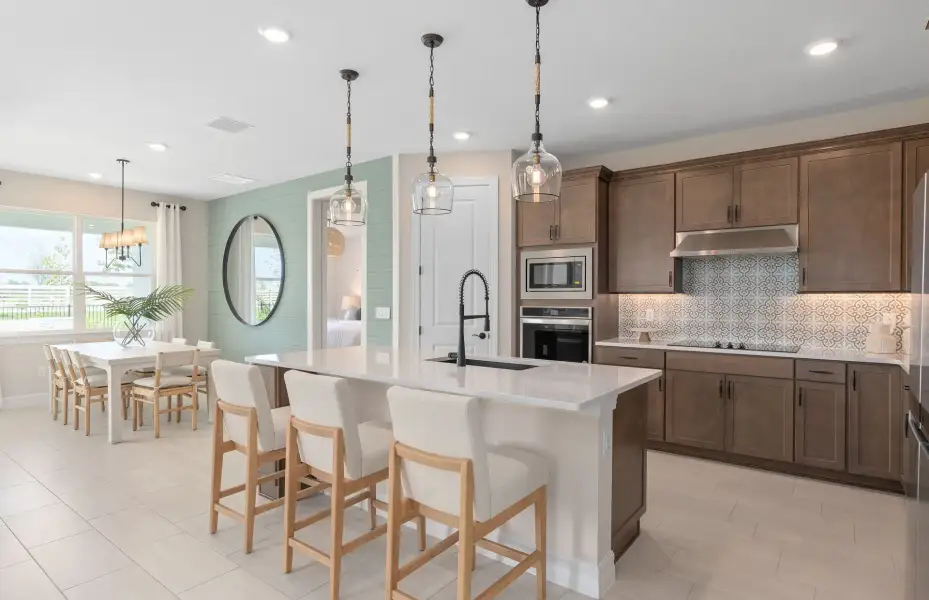 Representative furnished interior of a home built from the Coral Grand by Pulte Homes in Hilliard Isle, Kissimmee (Image 5).