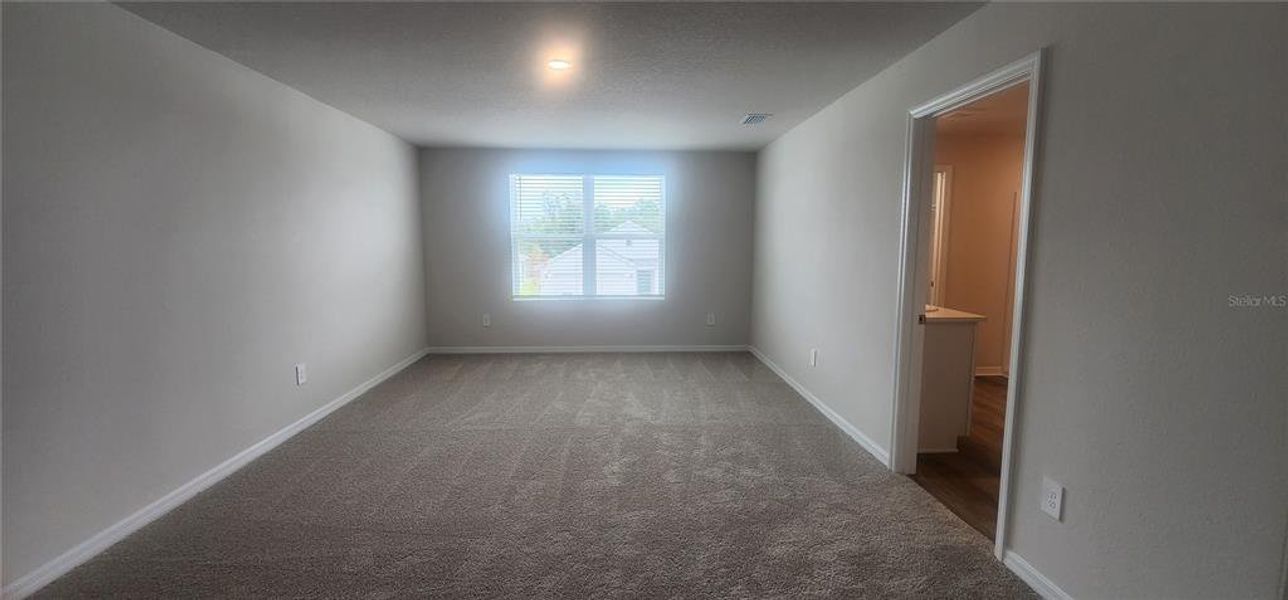 Spacious, unfurnished interior of a new home in Oakfield Lakes, Parrish (Image 20).