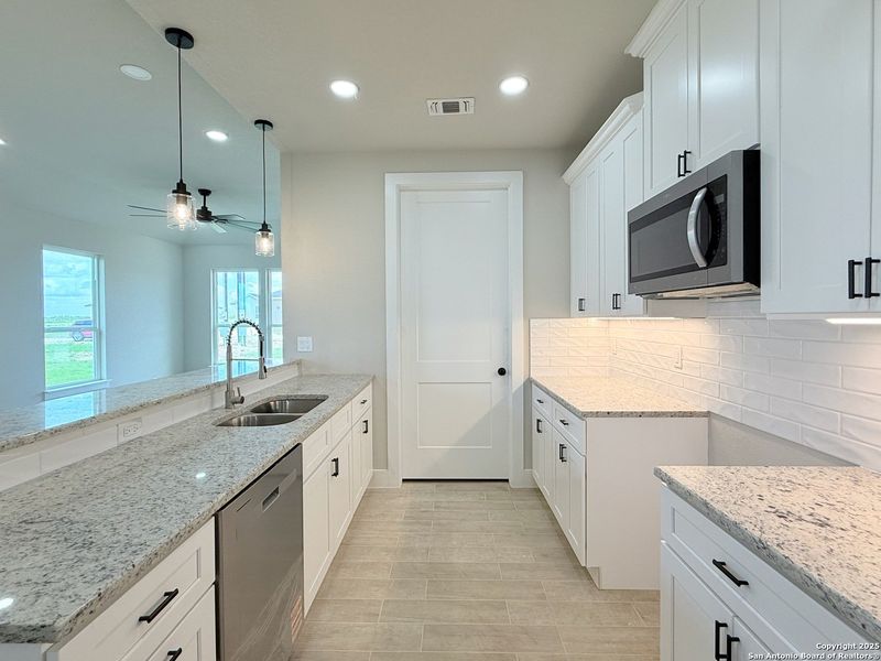 Furnished interior view inside a new home in , La Vernia (Image 6). Furnished interior view inside a new home in , La Vernia (Image 6).