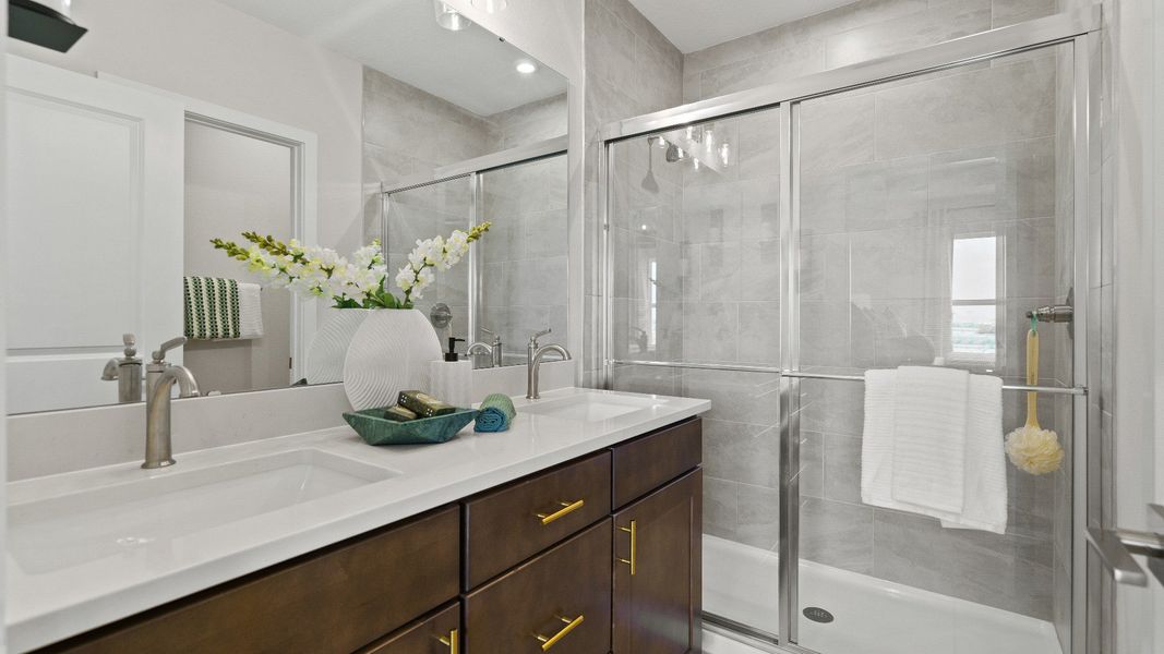 The Atlantic Model by DRB Homes Primary en Suite Bath located in Winter Haven, FL The Atlantic Model by DRB Homes Primary en Suite Bath located in Winter Haven, FL