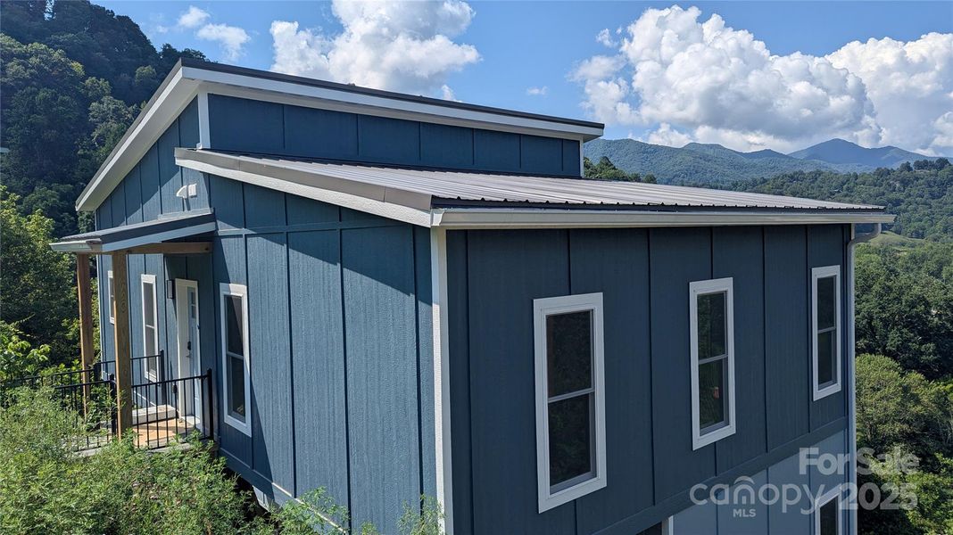 Front exterior of a new home in , Waynesville, NC, highlighting curb appeal (Image 11).