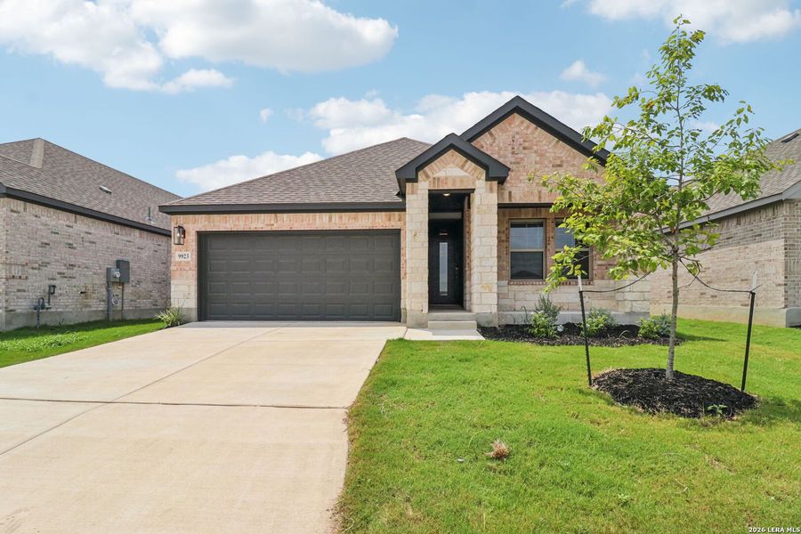 Front exterior of a new home in Kallison Ranch, San Antonio, TX, highlighting curb appeal (Image 23).
