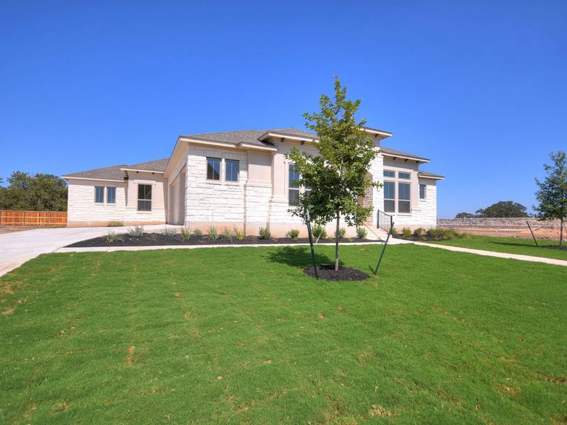 Representative exterior photo of a completed home built from the Siena III by Giddens Homes in Clearwater Ranch, Liberty Hill, TX (Image 30).