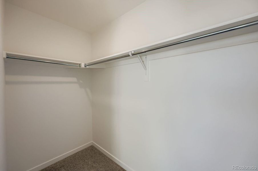 Spacious, unfurnished interior of a new home in Percheron: The Explorer Collection, Colorado Springs (Image 8).