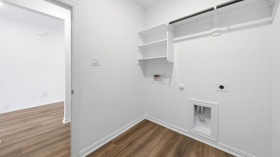 Furnished interior view inside a new home in Oaks at San Gabriel, Georgetown (Image 17).