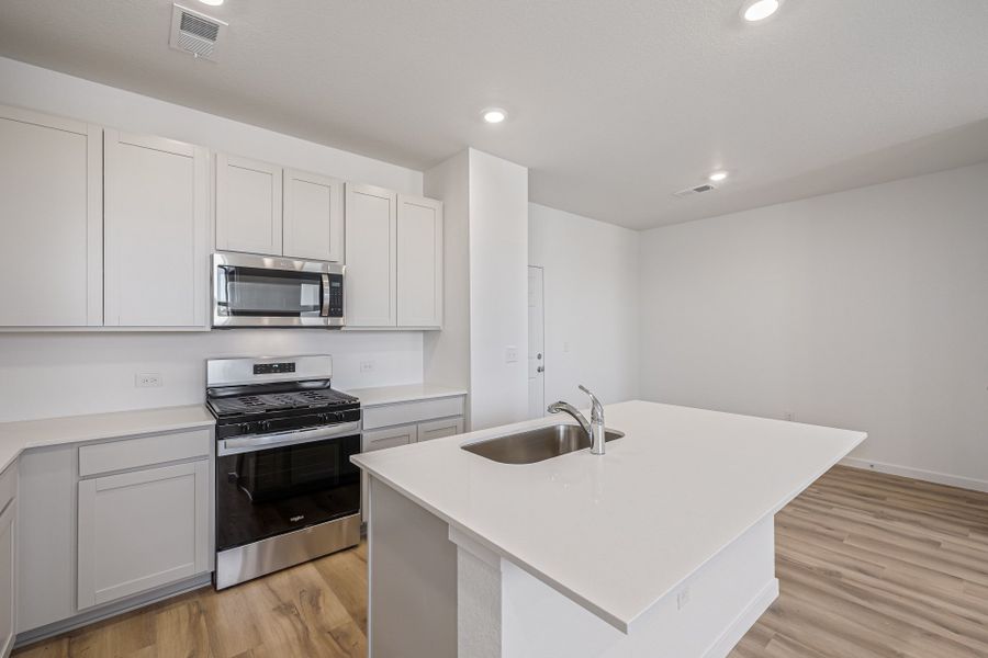 Furnished interior view inside a new home in Painted Prairie, Aurora (Image 11).