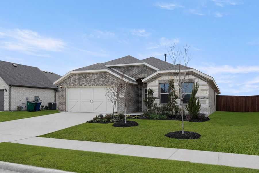 Front exterior of a new home in Myrtle Creek, Waxahachie, TX, highlighting curb appeal (Image 2). Front exterior of a new home in Myrtle Creek, Waxahachie, TX, highlighting curb appeal (Image 2).