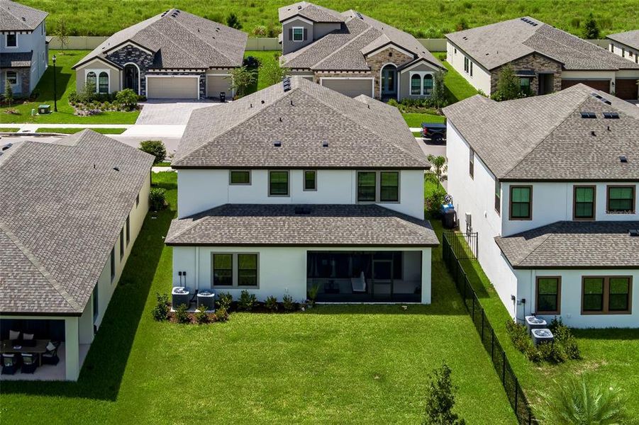Exterior details and patio area of a home in Crosswind Point, Parrish (Image 27).