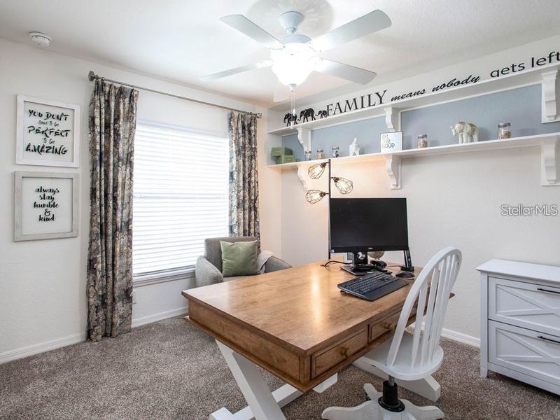 Furnished interior view inside a new home in Harbor at Lake Henry - Single-Family Homes, Winter Haven (Image 9).