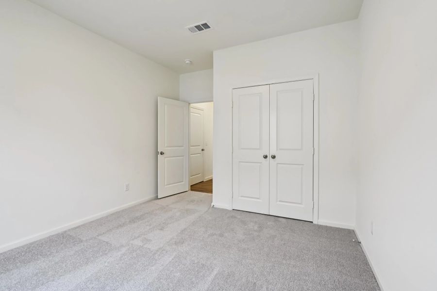 Representative unfurnished interior of a home built from the Magellan by Starlight Homes in Crossing at Givhans, Ridgeville (Image 22).