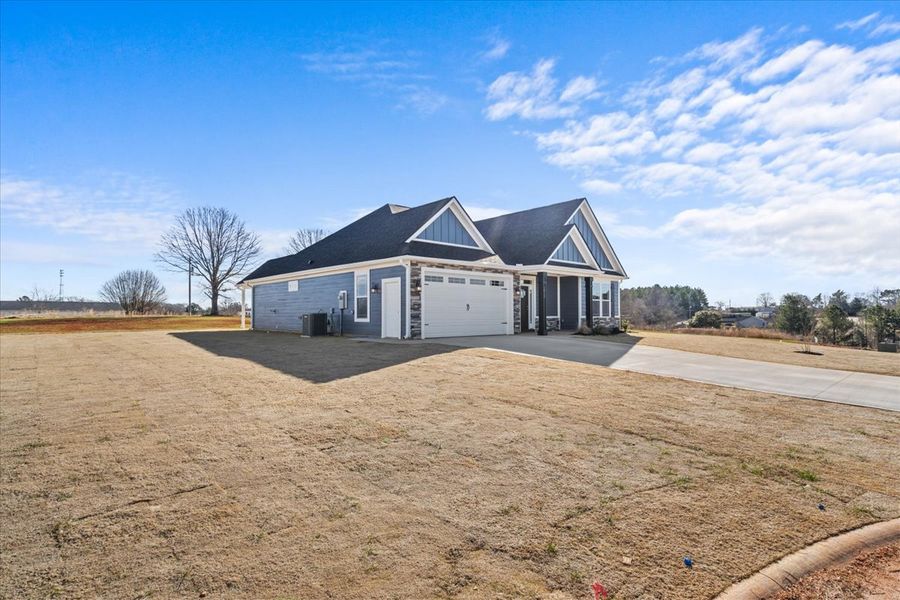 Representative exterior photo of a completed home built from the Roosevelt by Enchanted Homes in Messer Farms, Inman, SC (Image 21). Representative exterior photo of a completed home built from the Roosevelt by Enchanted Homes in Messer Farms, Inman, SC (Image 21).