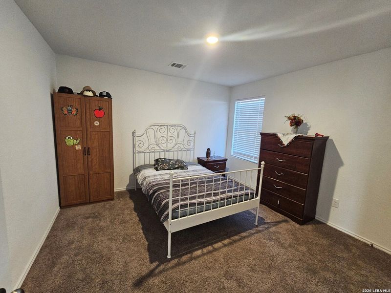 Furnished interior view inside a new home in , Seguin (Image 19).