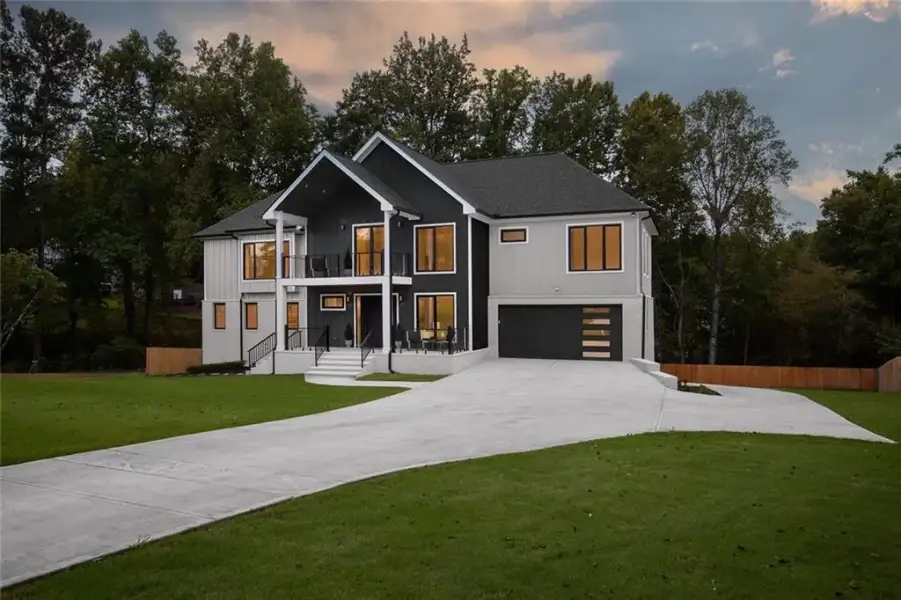Front exterior of a new home in , Marietta, GA, highlighting curb appeal (Image 36).