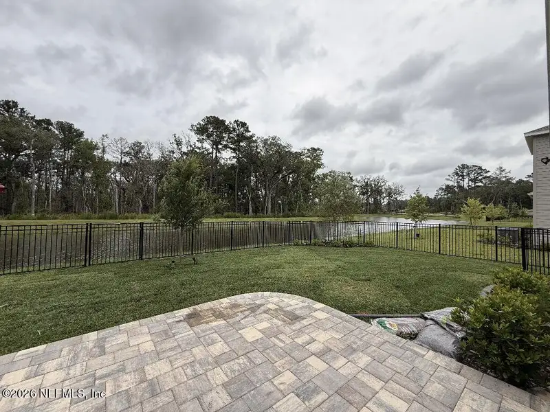 Exterior details and patio area of a home in Tributary, Yulee (Image 2).
